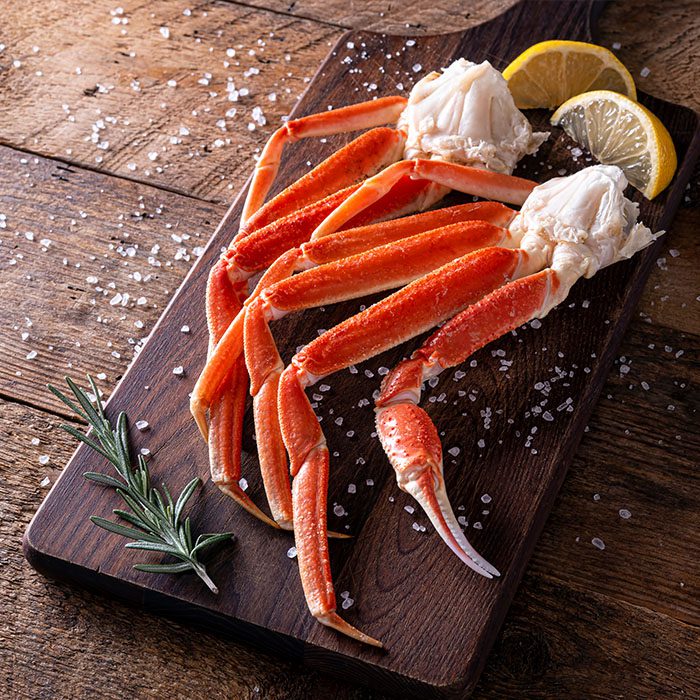 crab legs in wooden plate